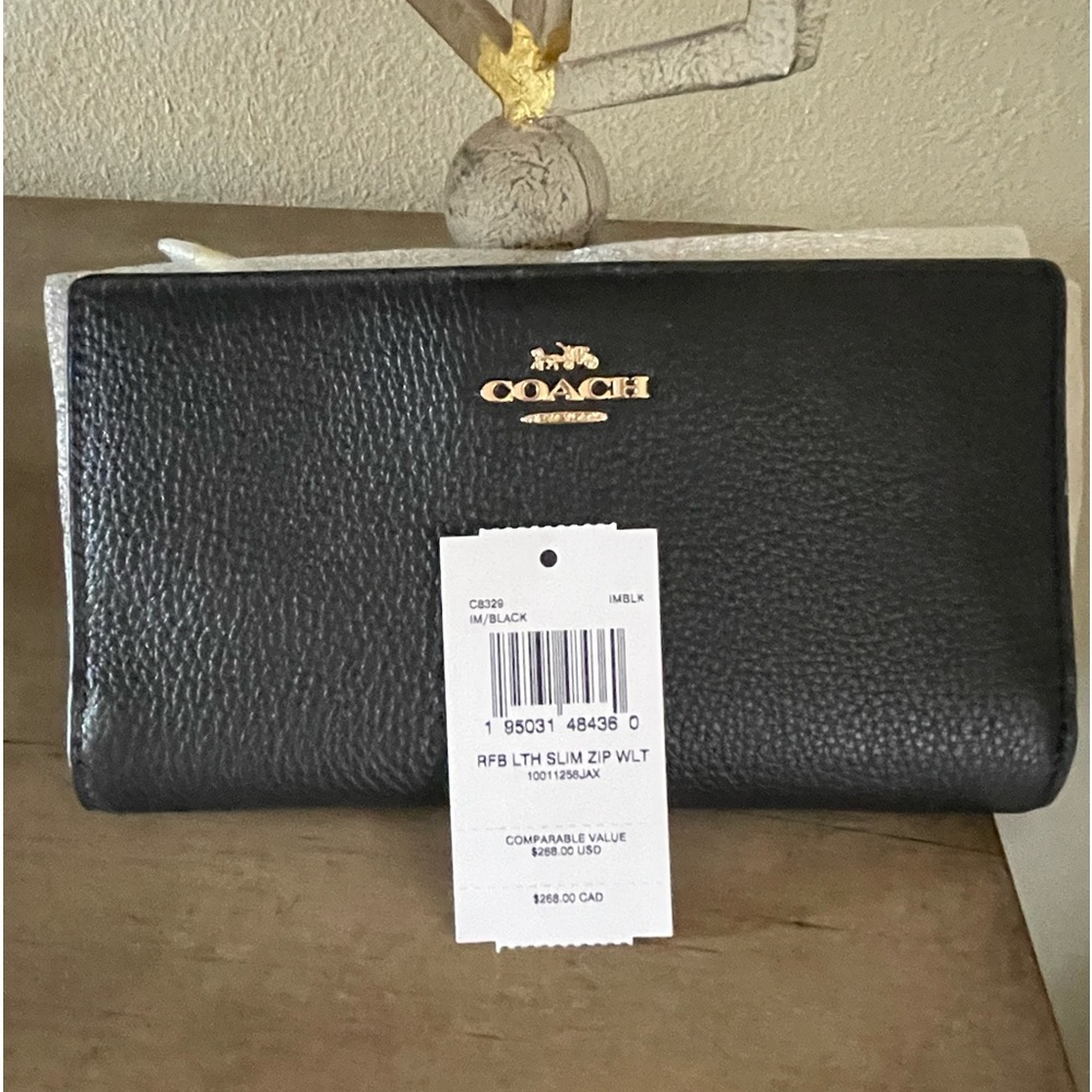 Coach wallet. Buttery soft like the one handbag I have for sale !
